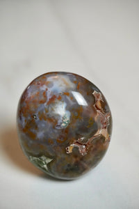 8th vein ocean jasper palm stone druzy