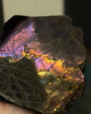 Purple crystal collector high grade Madagascar labradorite Freeform with pink purple yellow and orange flash 