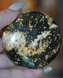 green 7th vein ocean jasper palm stone with yellow spots and druzy